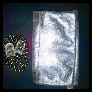 Gold leather clutch from Free People